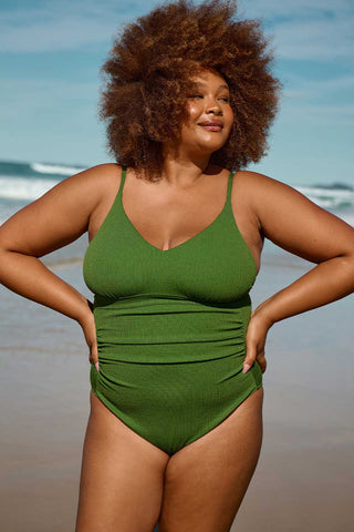 Model wears a XL. She is a size 16, wears a 16E bra and is 180cm tall.