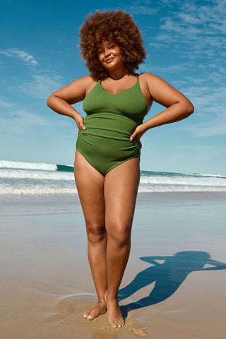 Model wears a XL. She is a size 16, wears a 16E bra and is 180cm tall.